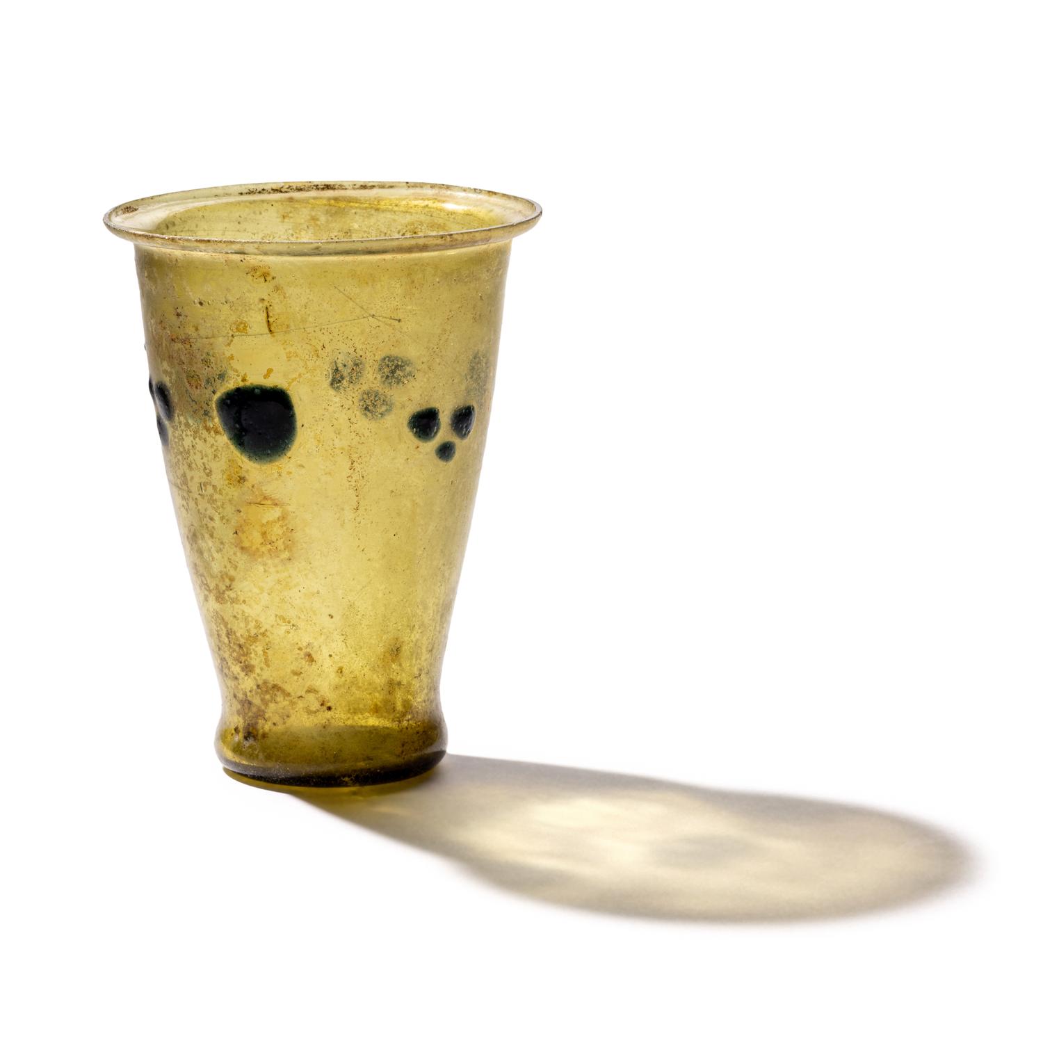A Late Roman Glass Cup with Blue Dots