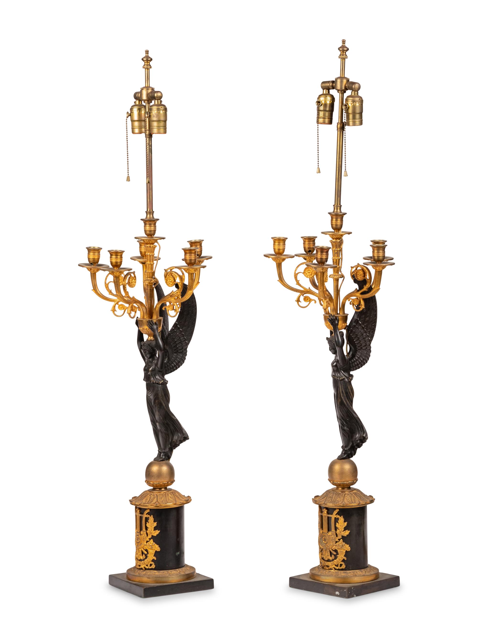 A Pair of Empire Style Gilt and Patinated Bronze Candelabra Mounted as Lamps