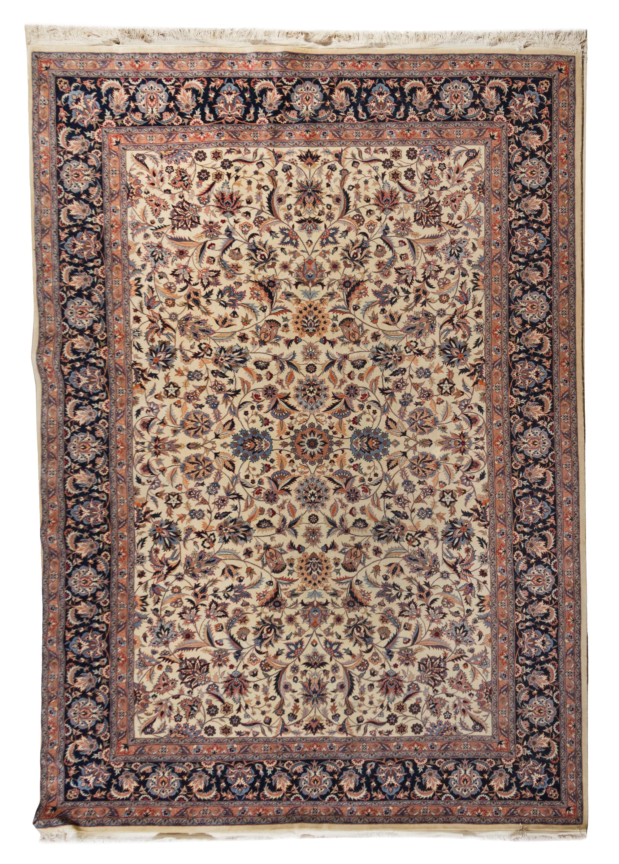 A Persian Wool and Silk Rug 10 feet 1 inch x 6 feet 9 inches.