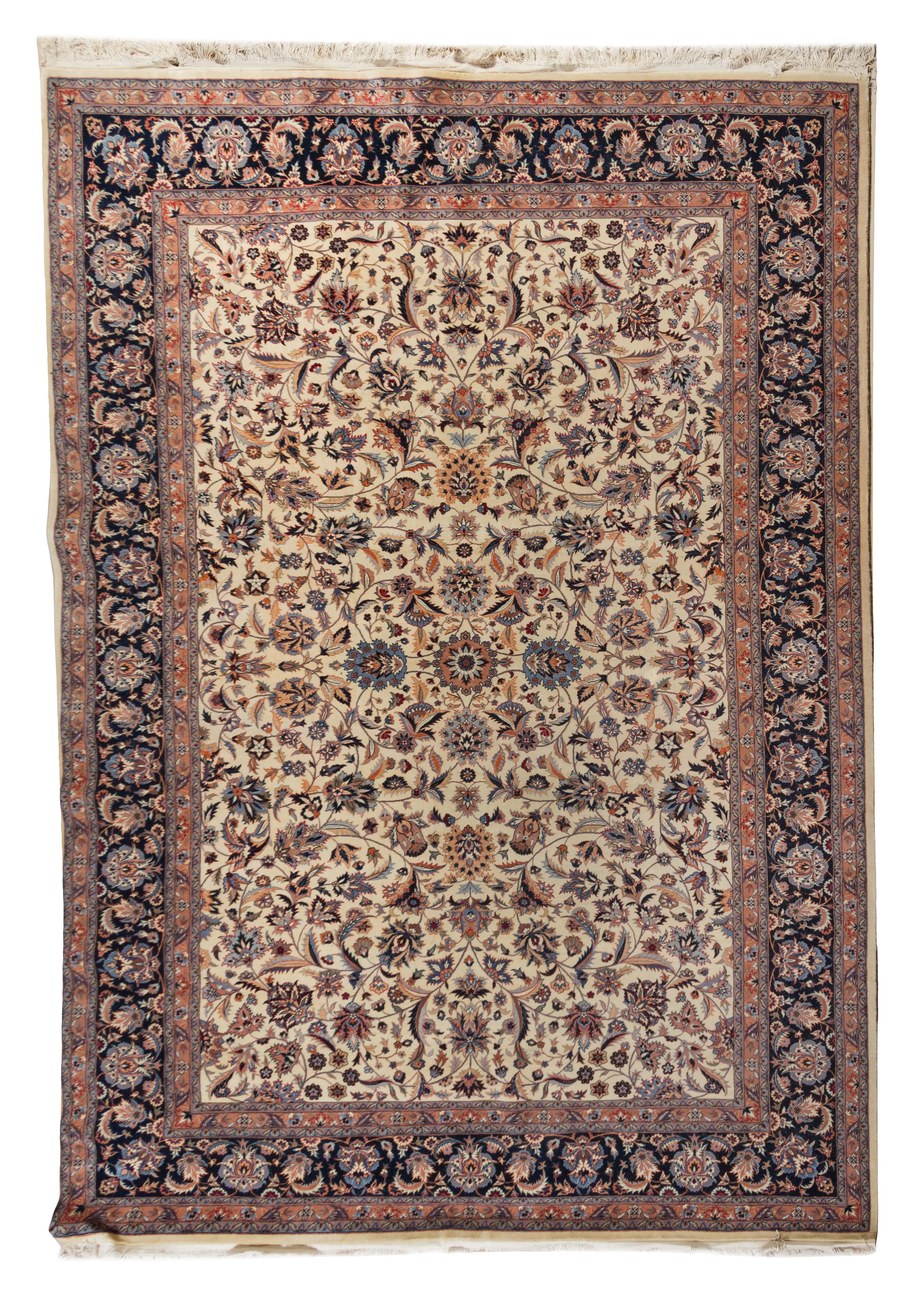 A Persian Wool and Silk Rug 10 feet 1 inch x 6 feet 9 inches.