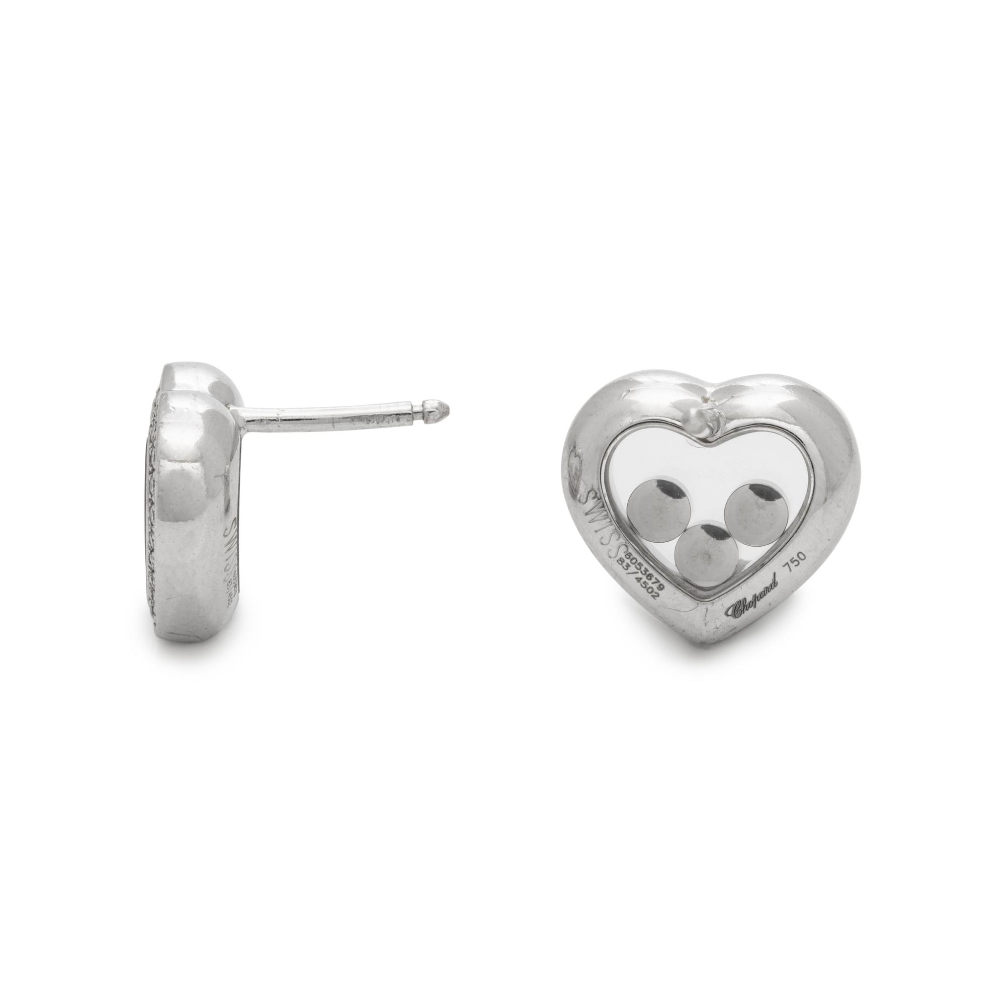CHOPARD, WHITE GOLD AND DIAMOND 'HAPPY DIAMONDS' STUD EARRINGS