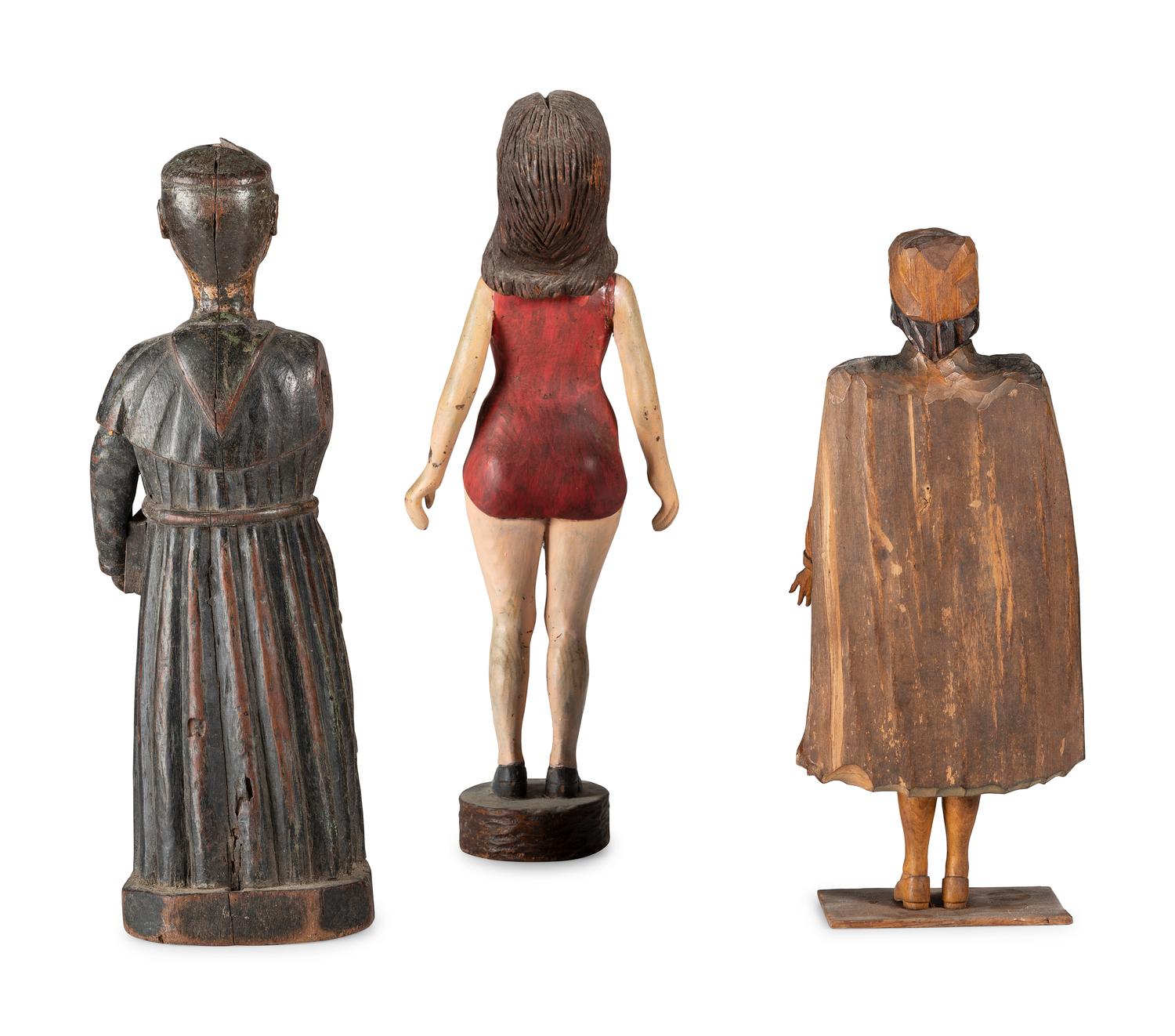 Three Carved and Painted Wooden Figures