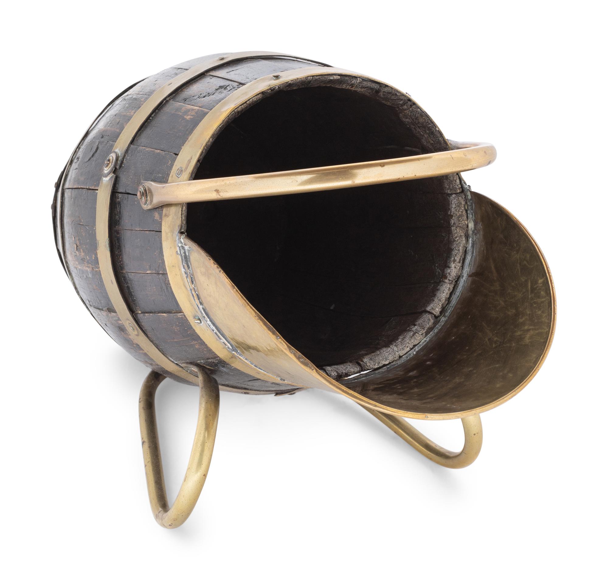 An English Brass Mounted Oak Jug