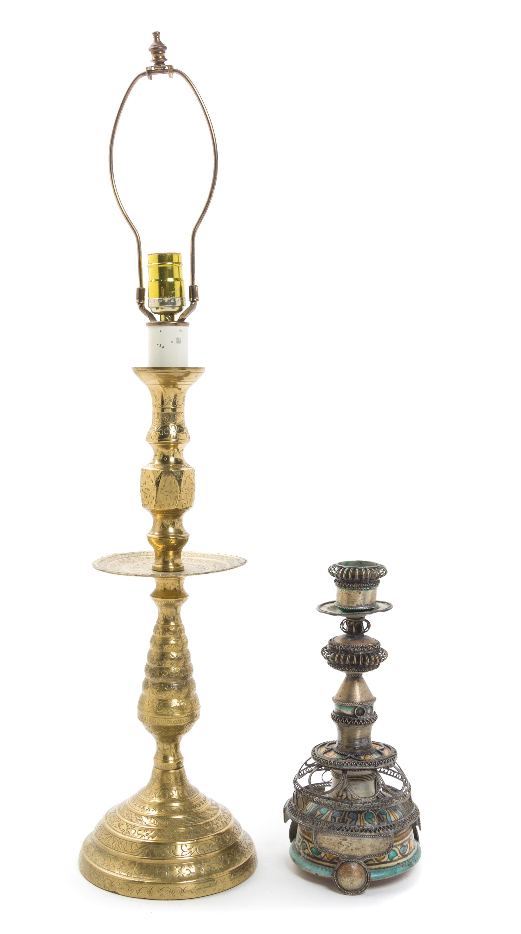 A Middle Eastern Pottery Candlestick and a Brass Table Lamp Height of first 31 inches.