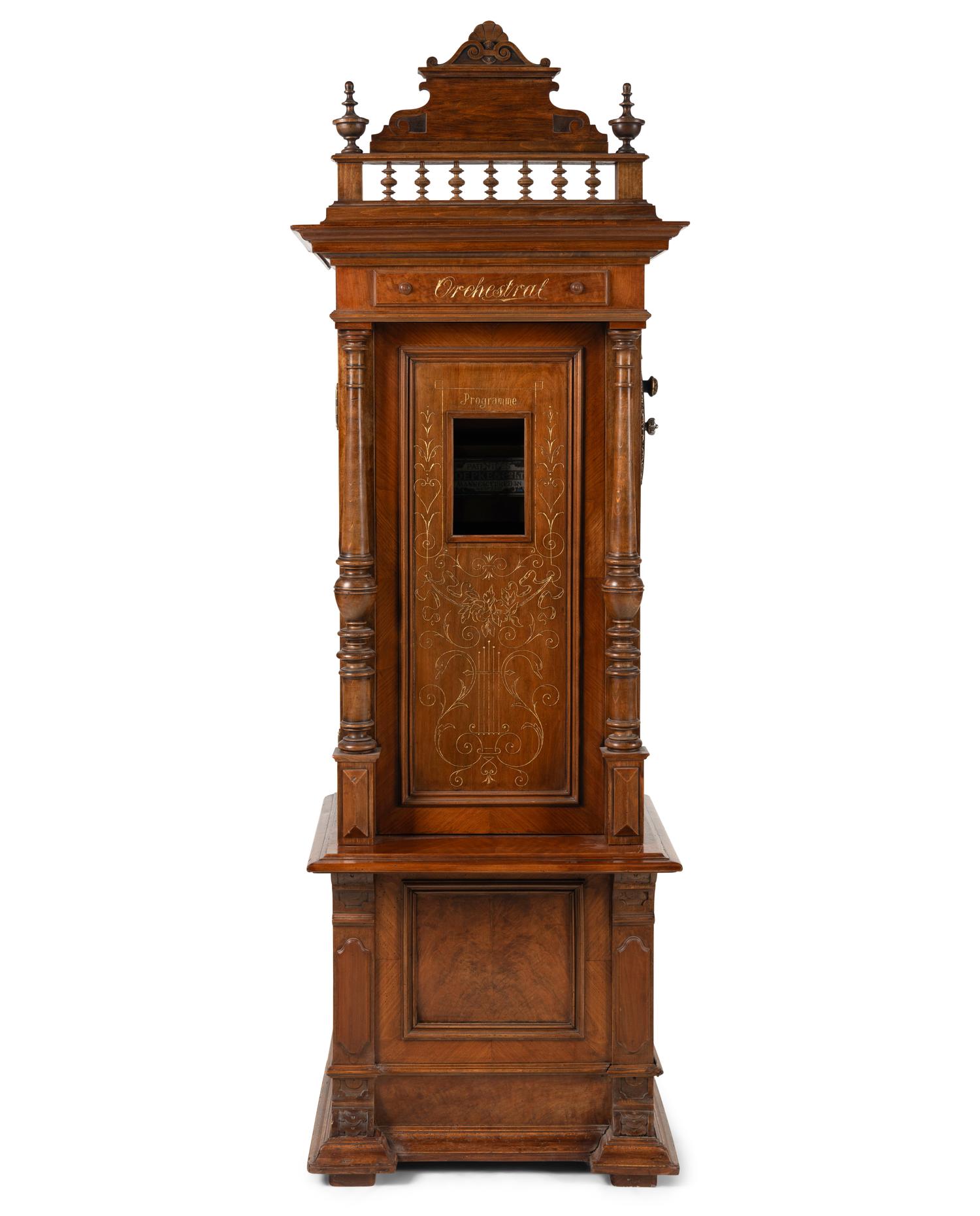 A Roepke Orchestral Book Playing Music Box with Fifteen Books