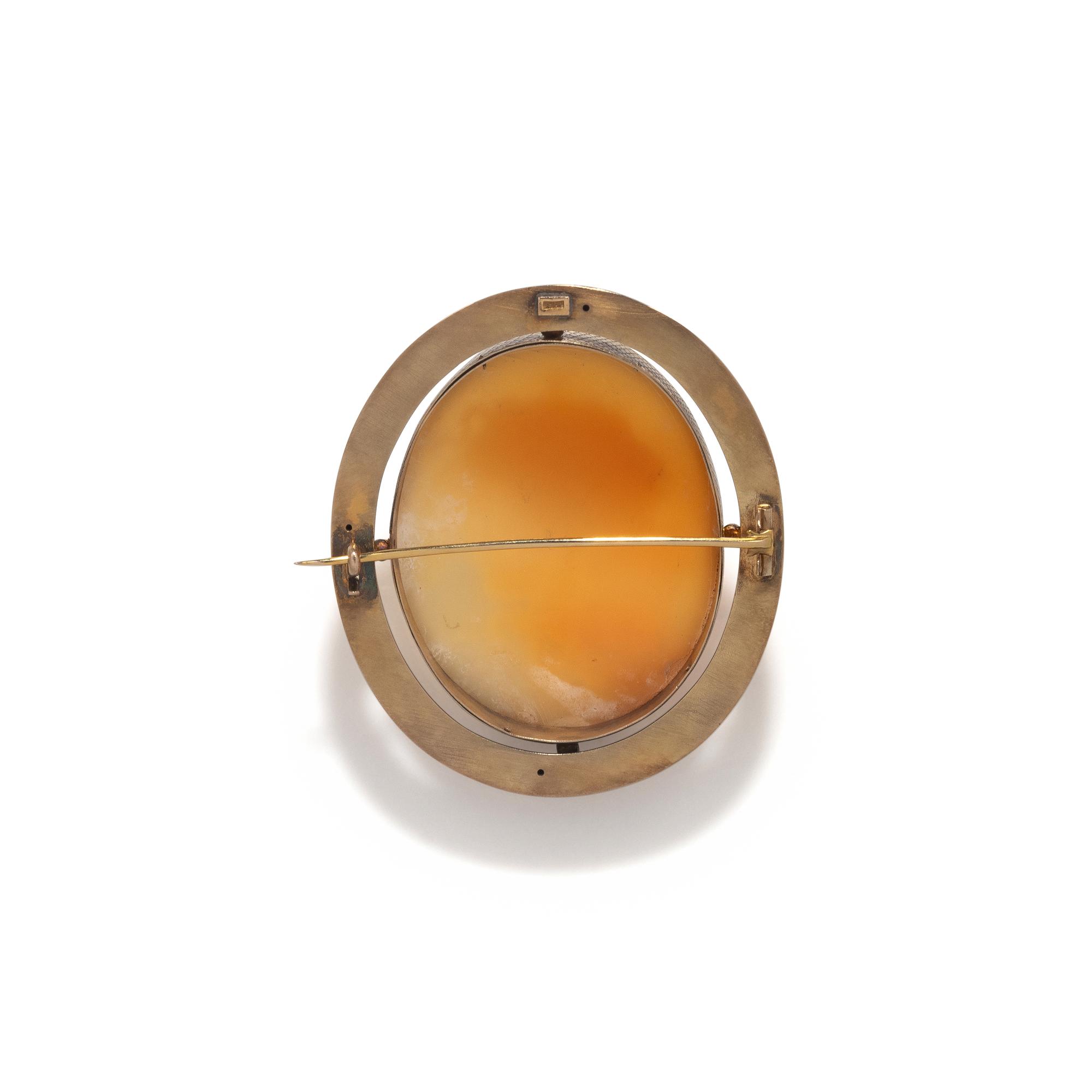 YELLOW GOLD AND SHELL MEDUSA CAMEO BROOCH
