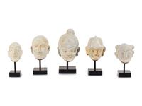Five Glazed Earthenware Deity Heads
