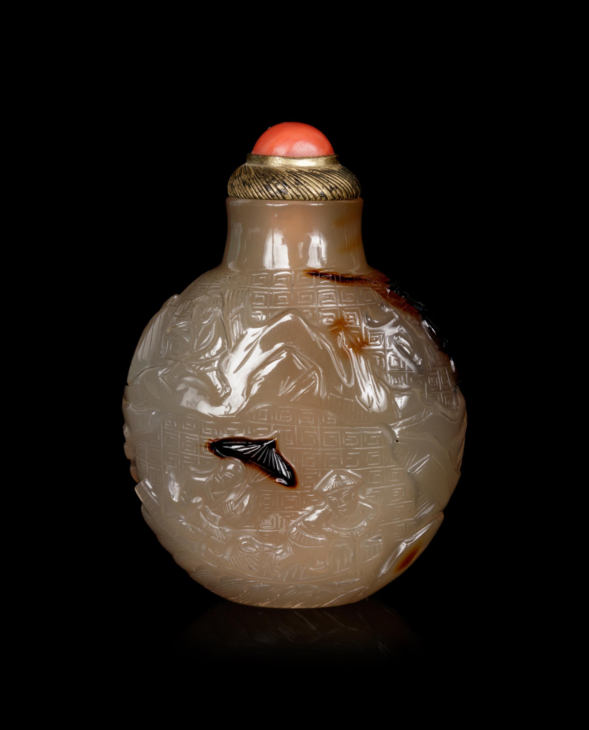 A Well Carved Shadow Agate Snuff Bottle
