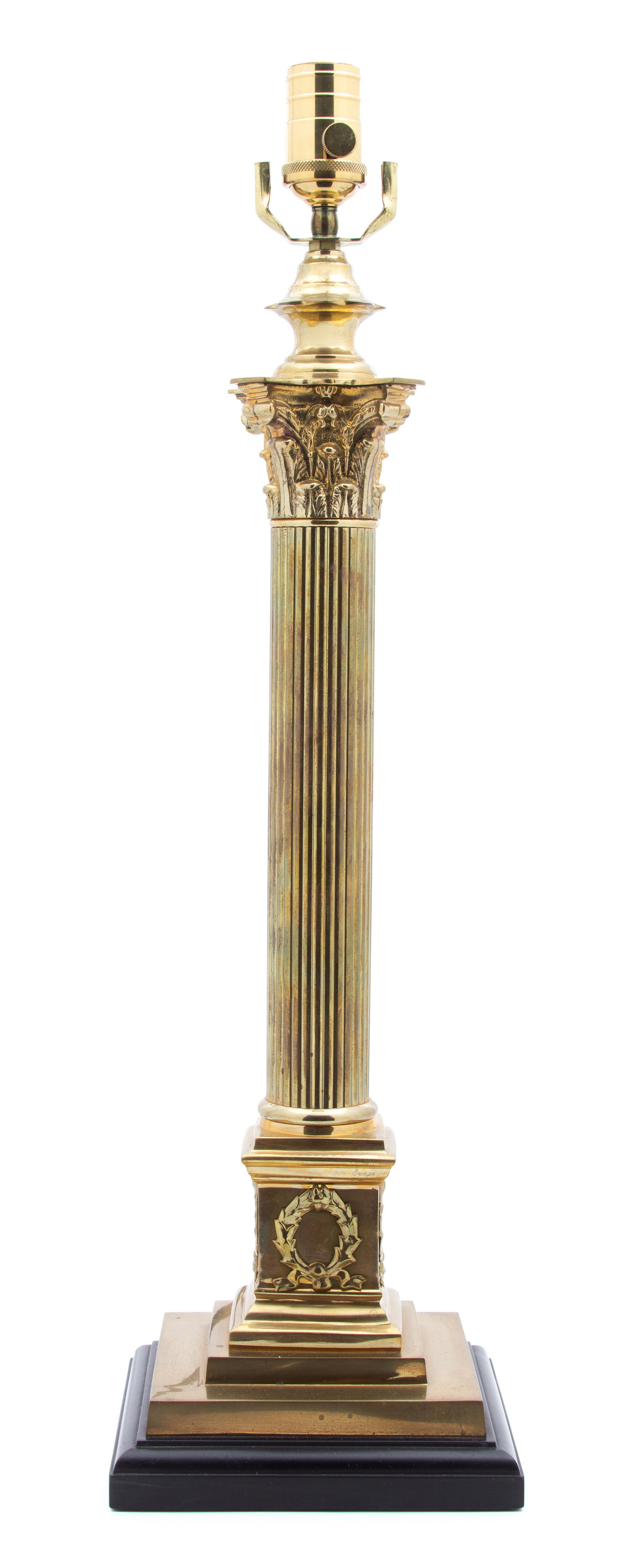 A Neoclassical Style Brass Columnar Table Lamp Height 21 inches. — 20TH CENTURY