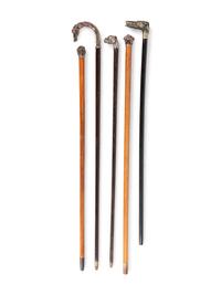 Five Silver and Silvered-Metal Mounted Zoomorphic Canes and Walking Sticks