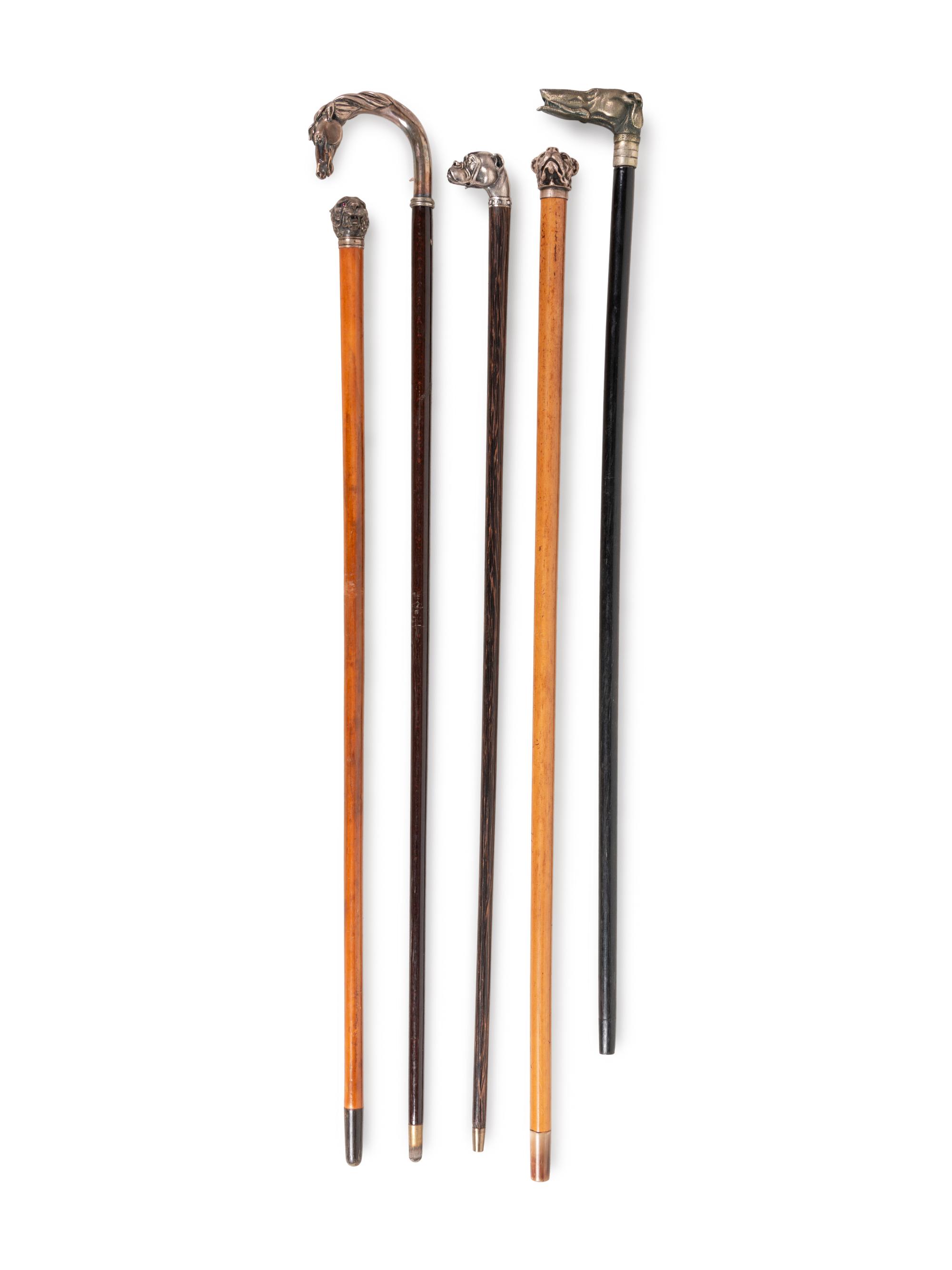 Five Silver and Silvered-Metal Mounted Zoomorphic Canes and Walking Sticks