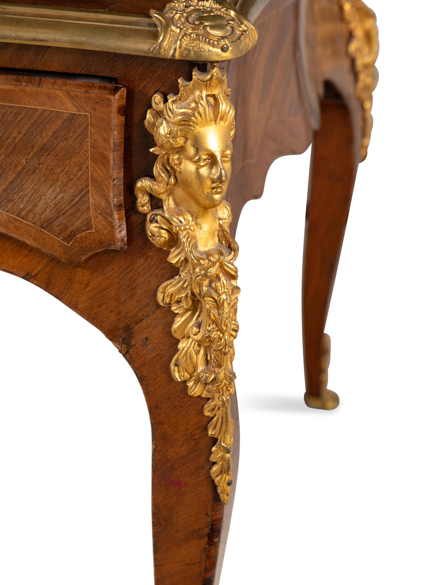 A Louis XV Style Gilt Bronze Mounted Kingwood Bureau Plat