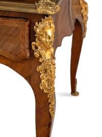 A Louis XV Style Gilt Bronze Mounted Kingwood Bureau Plat
