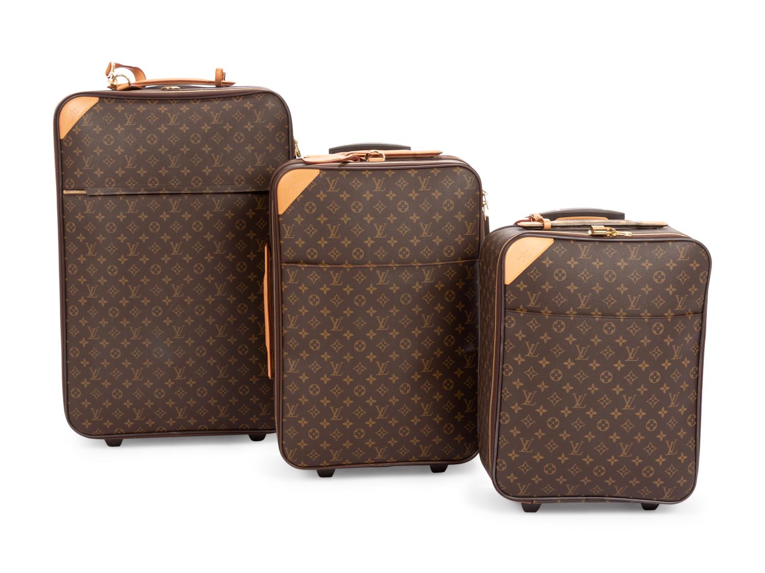 Three Louis Vuitton Monogram Rolling Luggage Pieces, 1990-2000s
