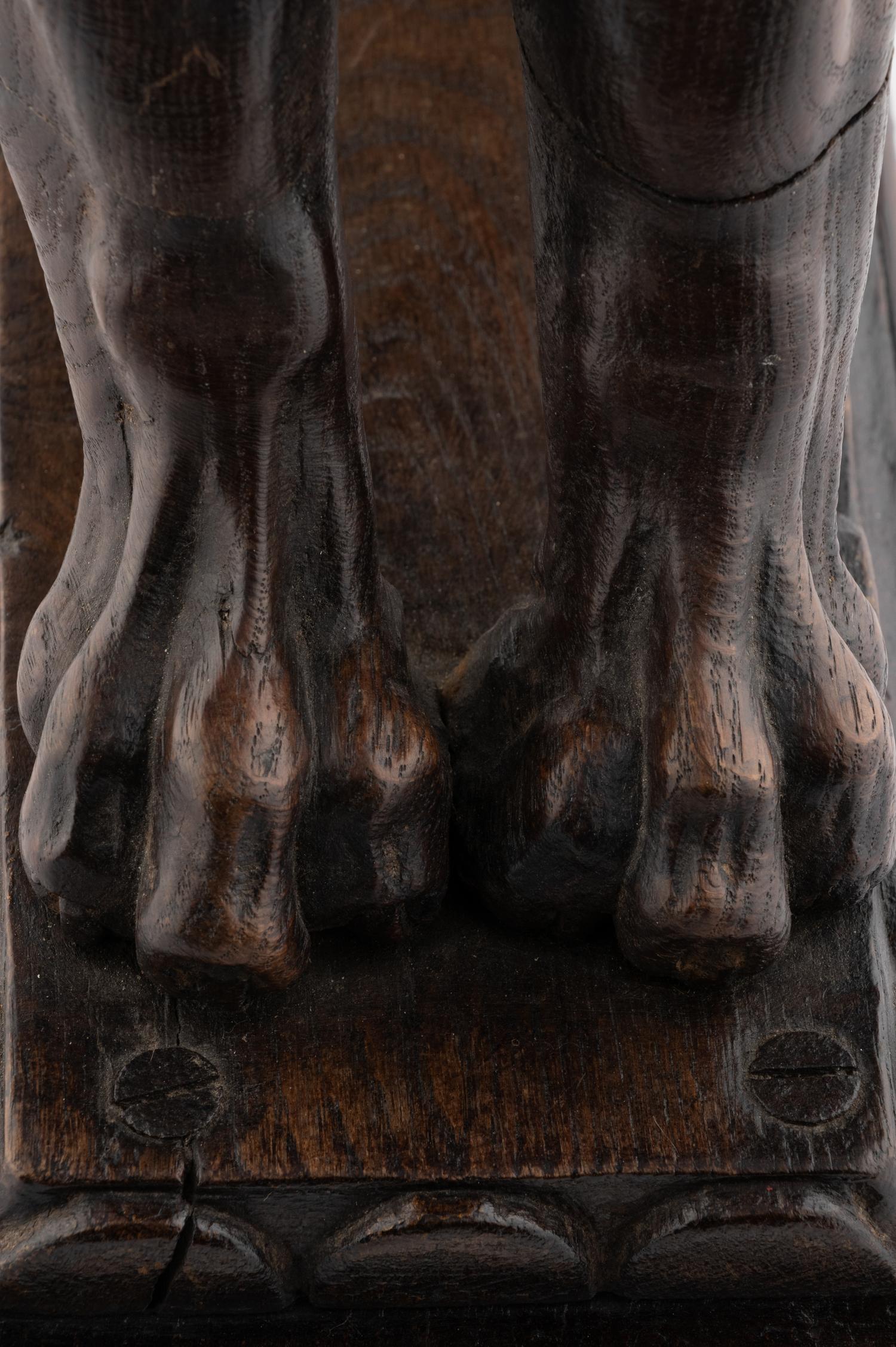 A Continental Carved Oak Lion