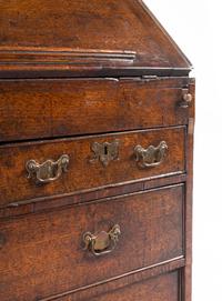 A George III Provincial Oak Slant-Front Secretary Desk