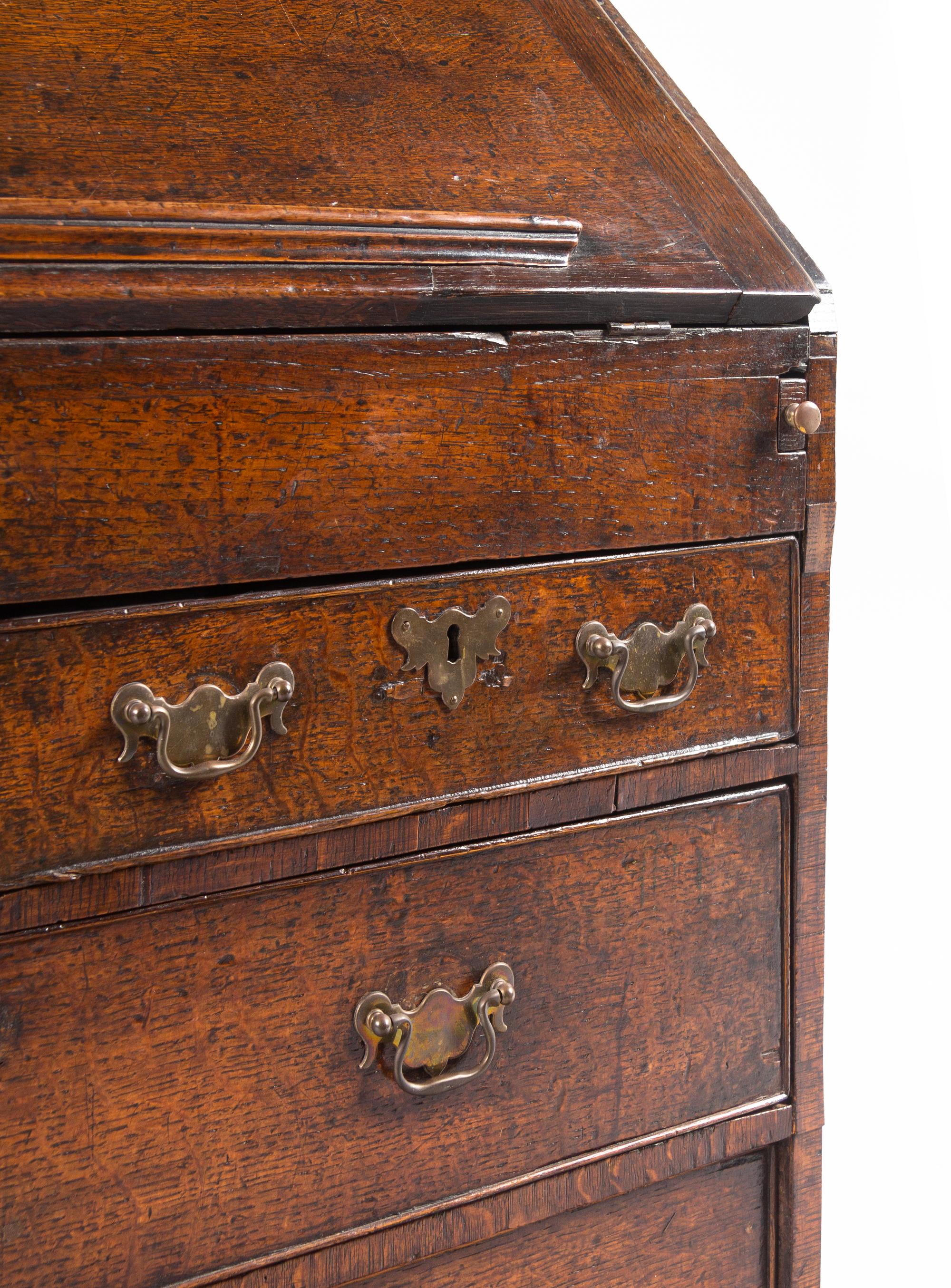 A George III Provincial Oak Slant-Front Secretary Desk