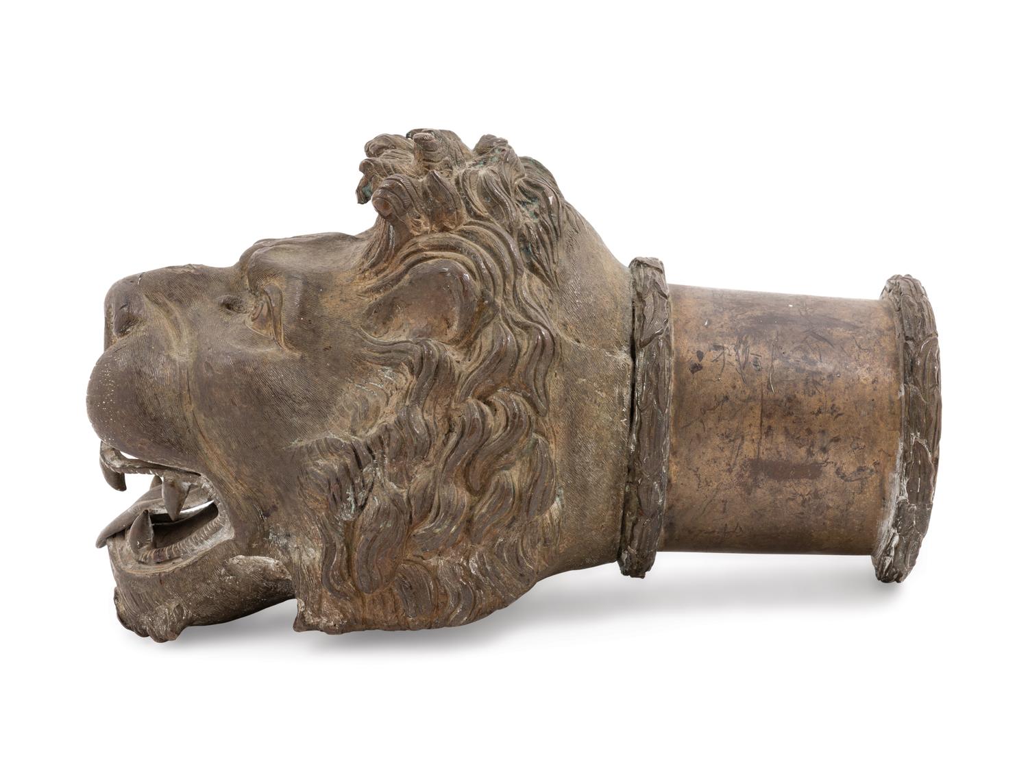 A Continental Bronze Lion Head Spout