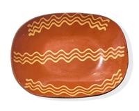 A Glazed and Slip-Decorated Redware Loaf Dish, Pennsylvania