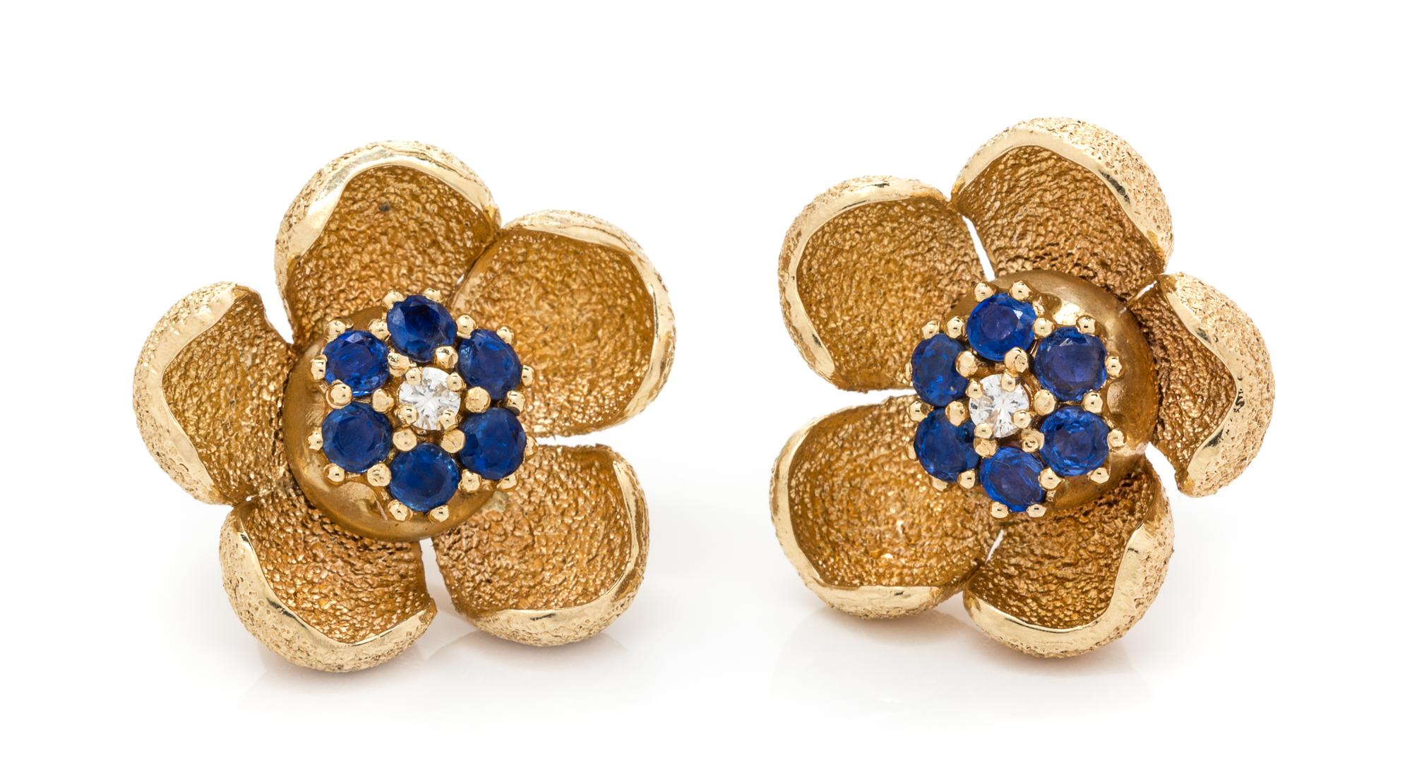 A Pair of 14 Karat Yellow Gold, Sapphire and Diamond Flower Motif Earclips, 15.60 dwts.