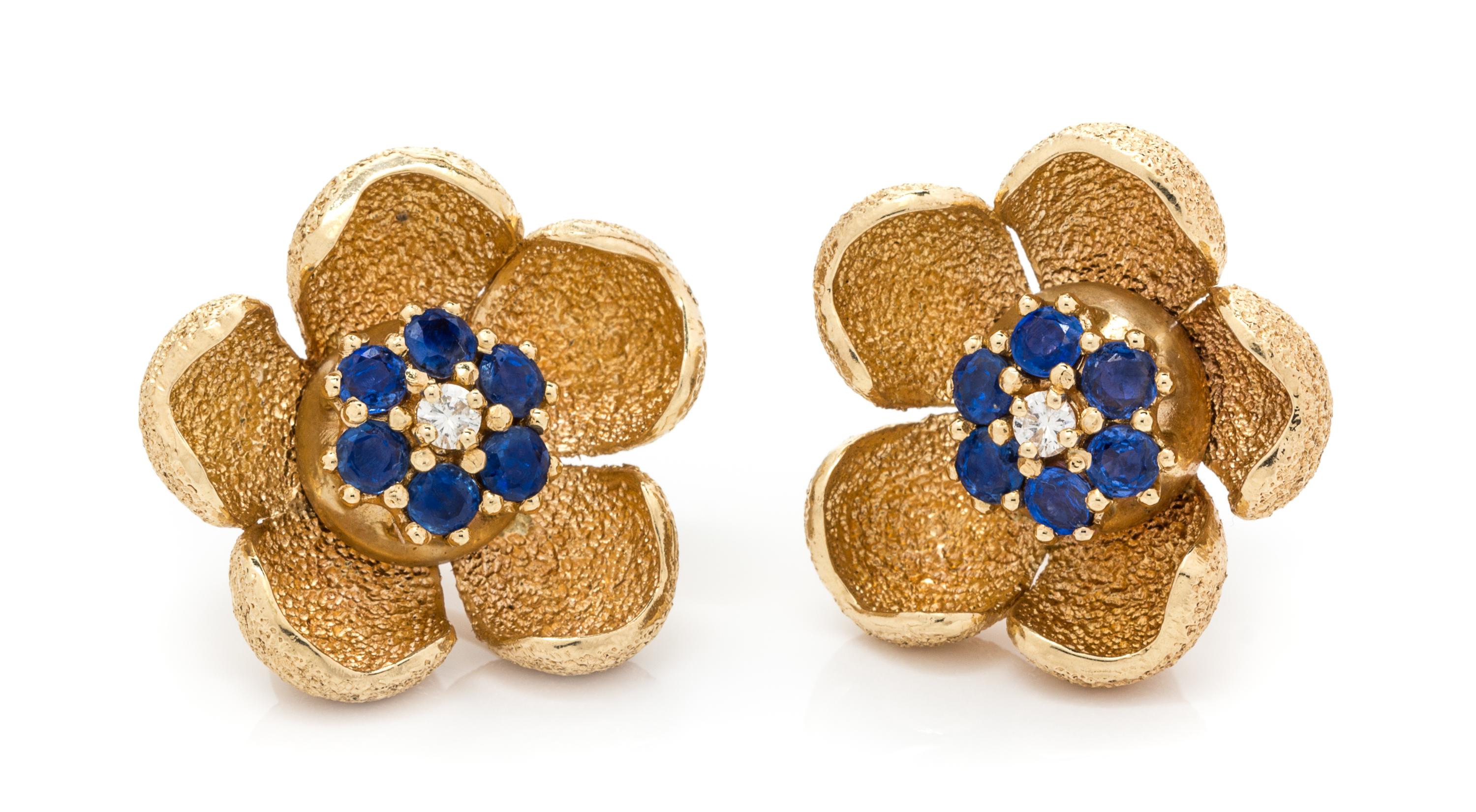 A Pair of 14 Karat Yellow Gold, Sapphire and Diamond Flower Motif Earclips, 15.60 dwts.