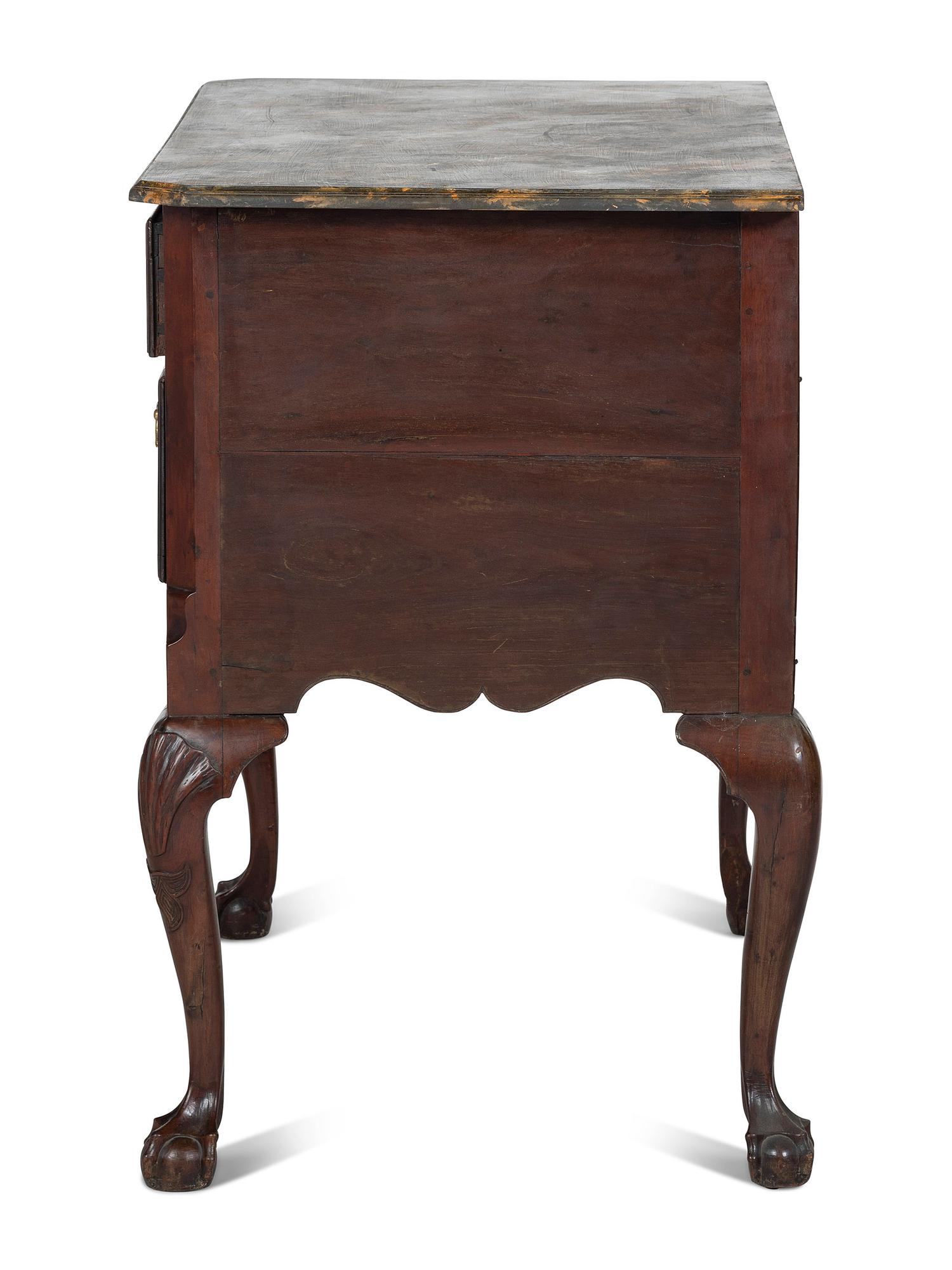 An Oversized Queen Anne Stained Shell-Carved Cherrywood Faux-Marble Top Dressing Table