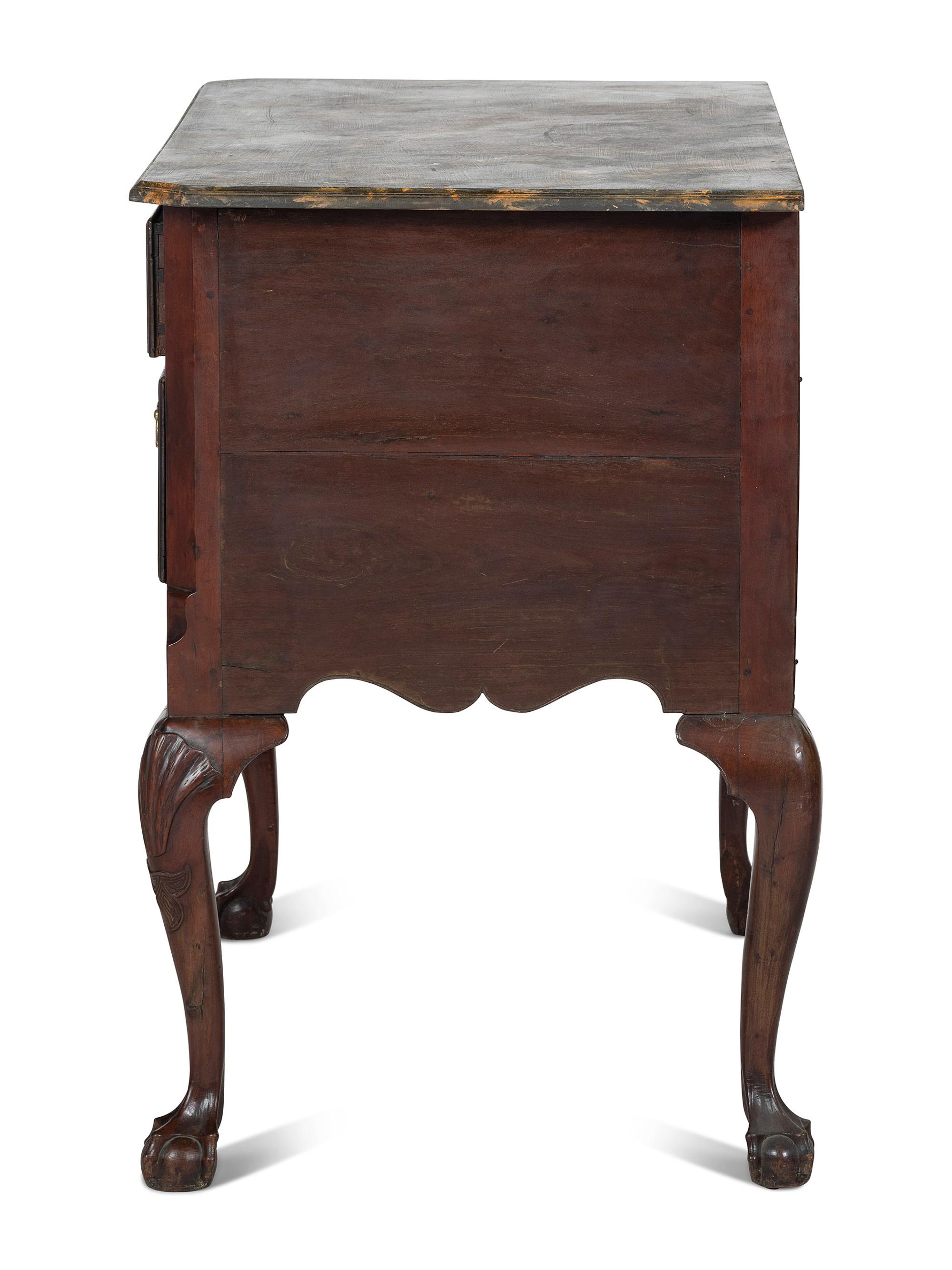 An Oversized Queen Anne Stained Shell-Carved Cherrywood Faux-Marble Top Dressing Table
