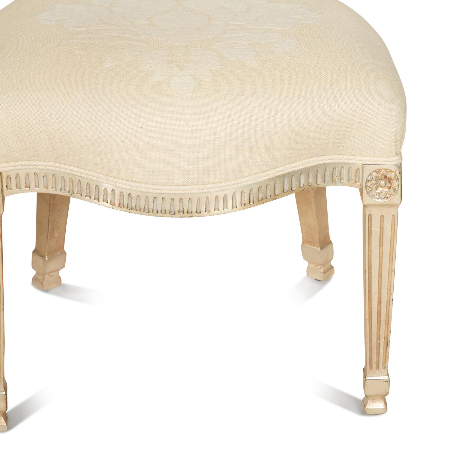 A Set of Twelve George III Style Silvered Wood Dining Chairs