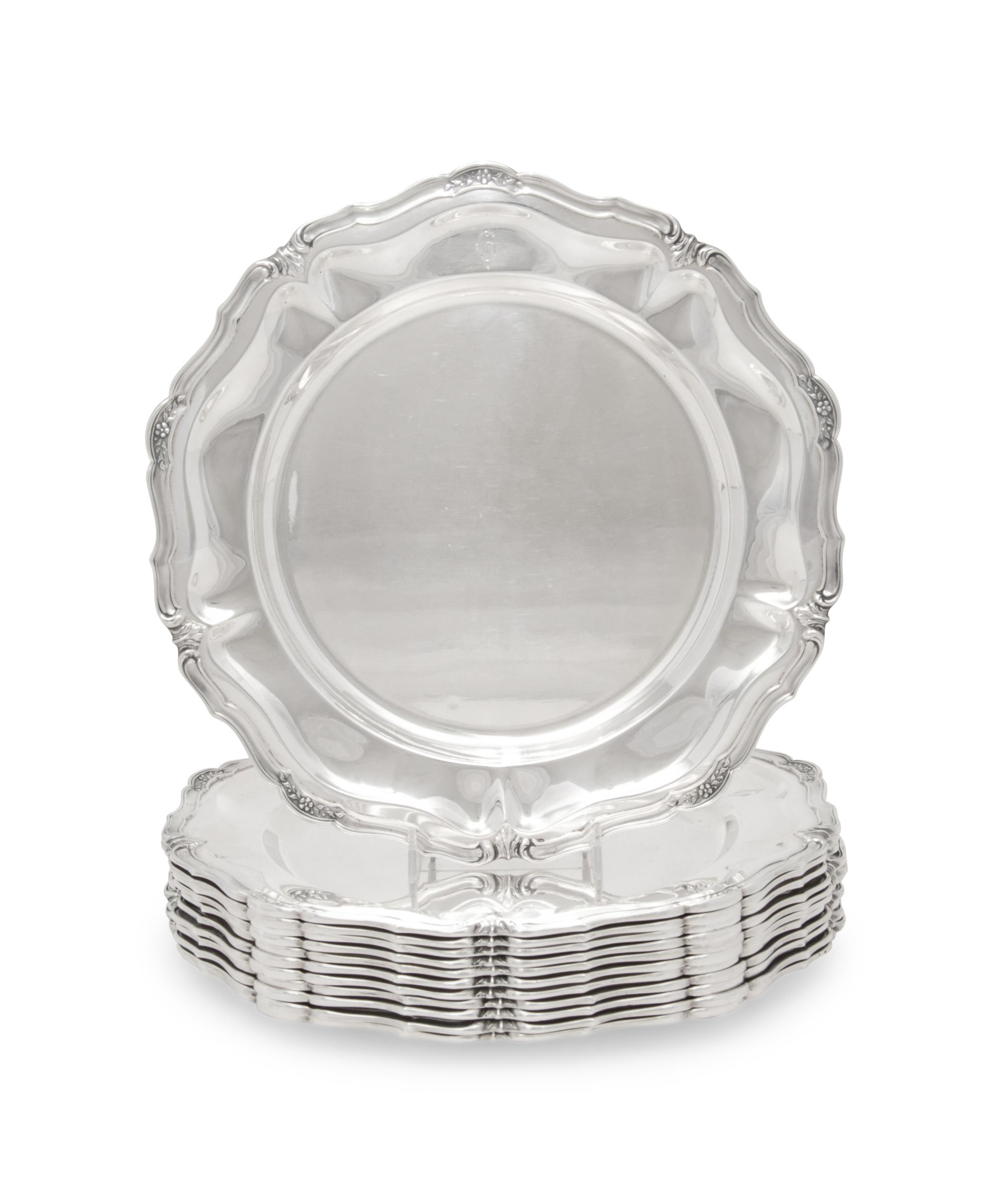A Set of Twelve Peruvian Silver Dinner Plates