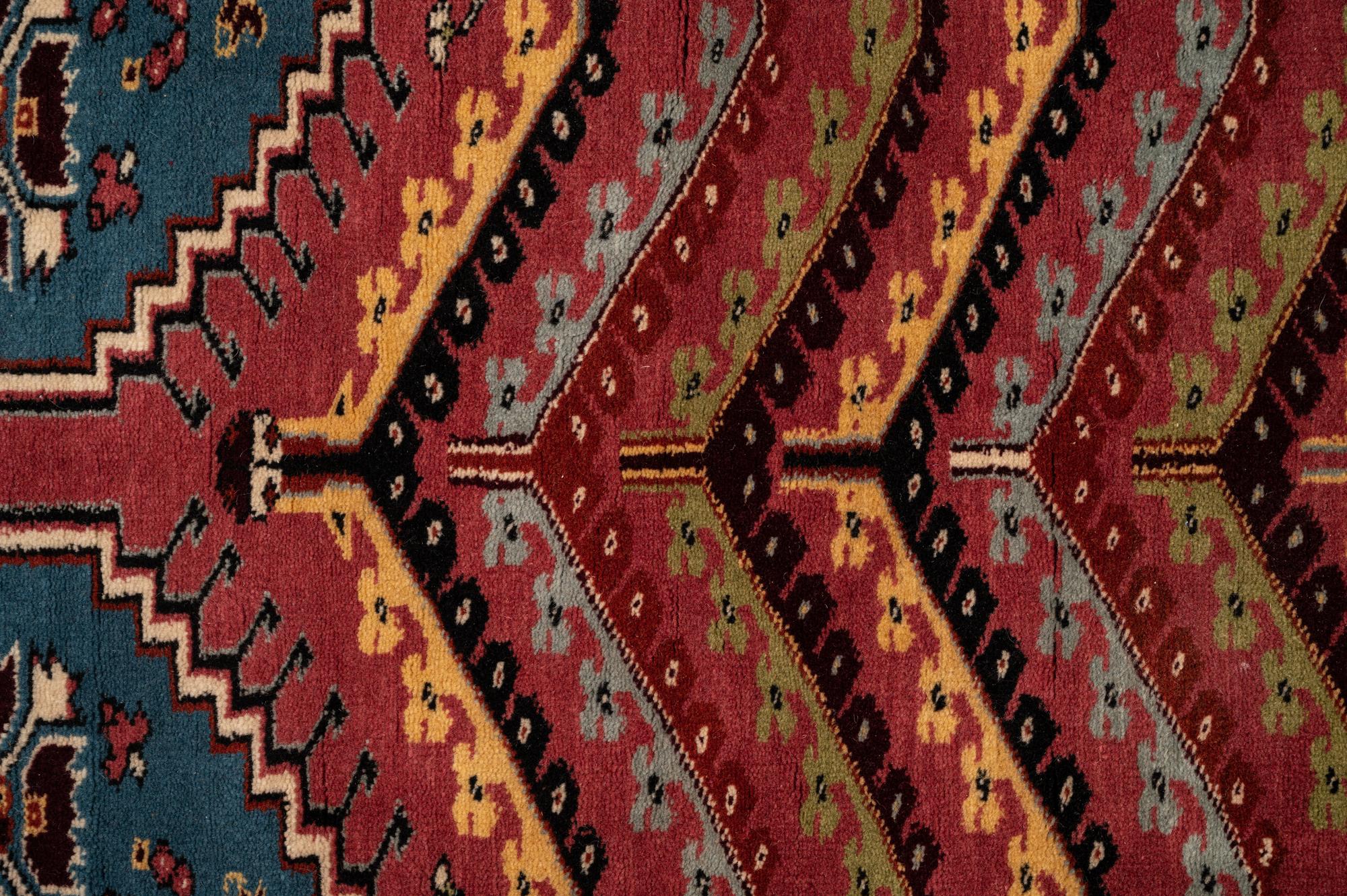 Four Turkish Wool Mats and a Baluch Design Wool Mat