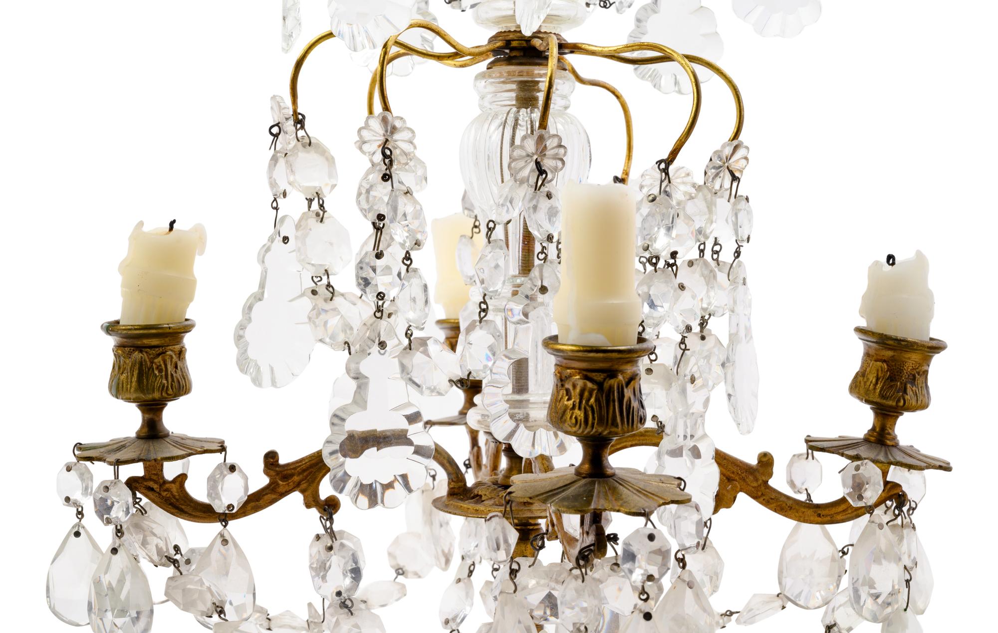 A Pair of French Gilt Bronze and Cut Glass Four-Light Candelabra