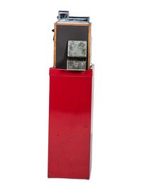 A Mills 'Sweetheart' Five Cent Slot Machine on Stand