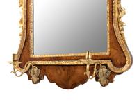 A George II Walnut and Parcel Gilt Girandole Mirror