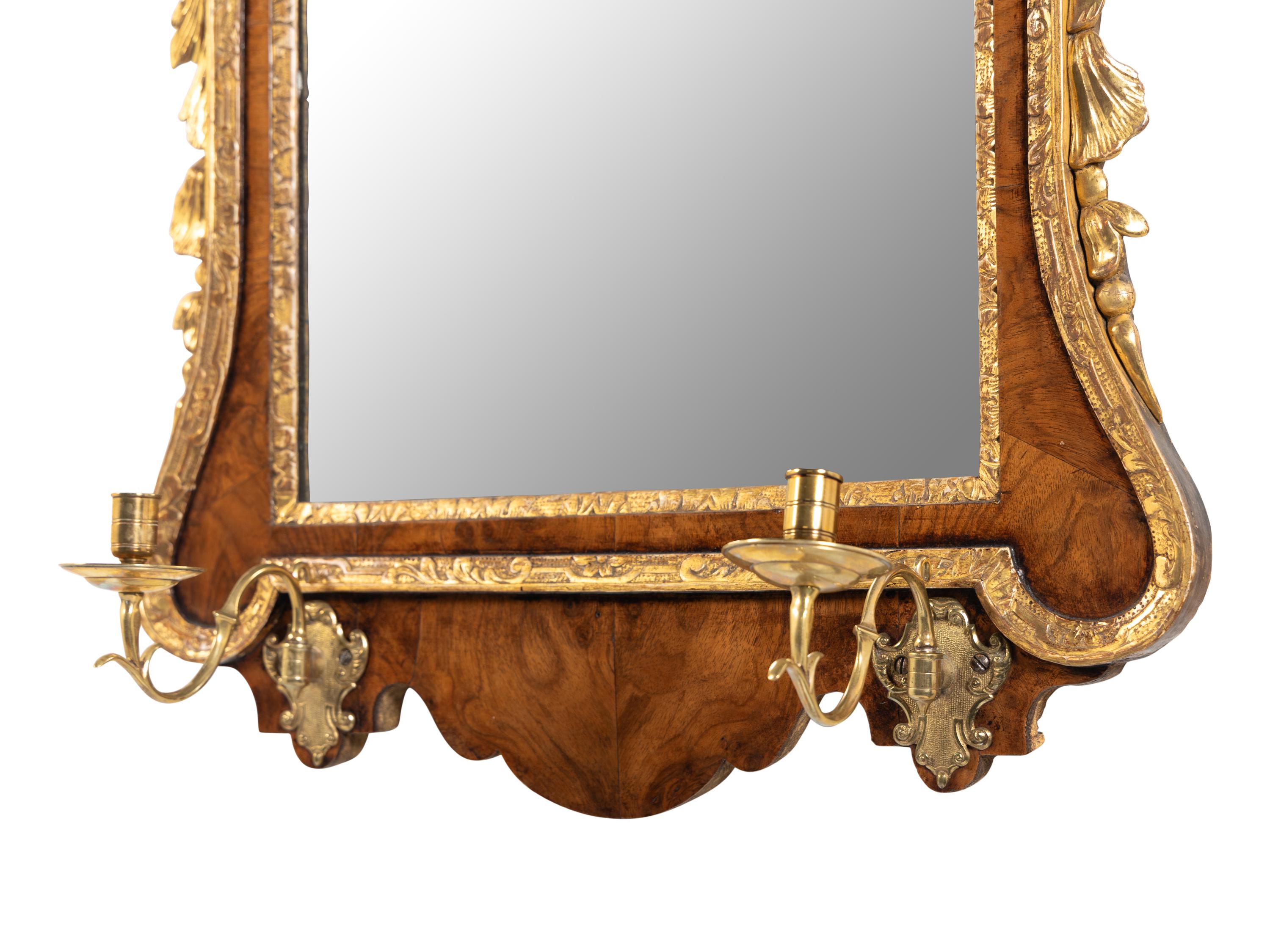 A George II Walnut and Parcel Gilt Girandole Mirror