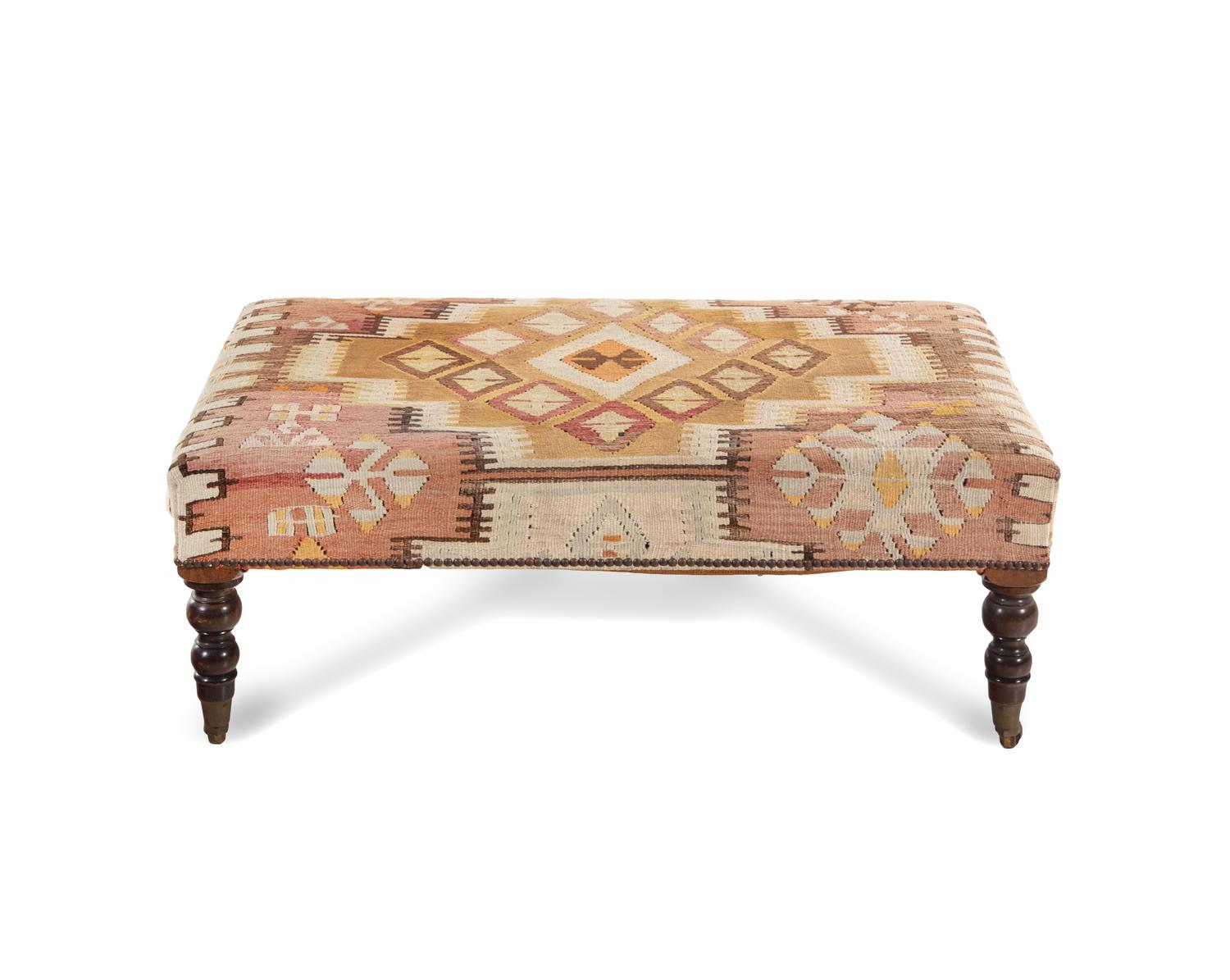 A Kilim Upholstered Ottoman