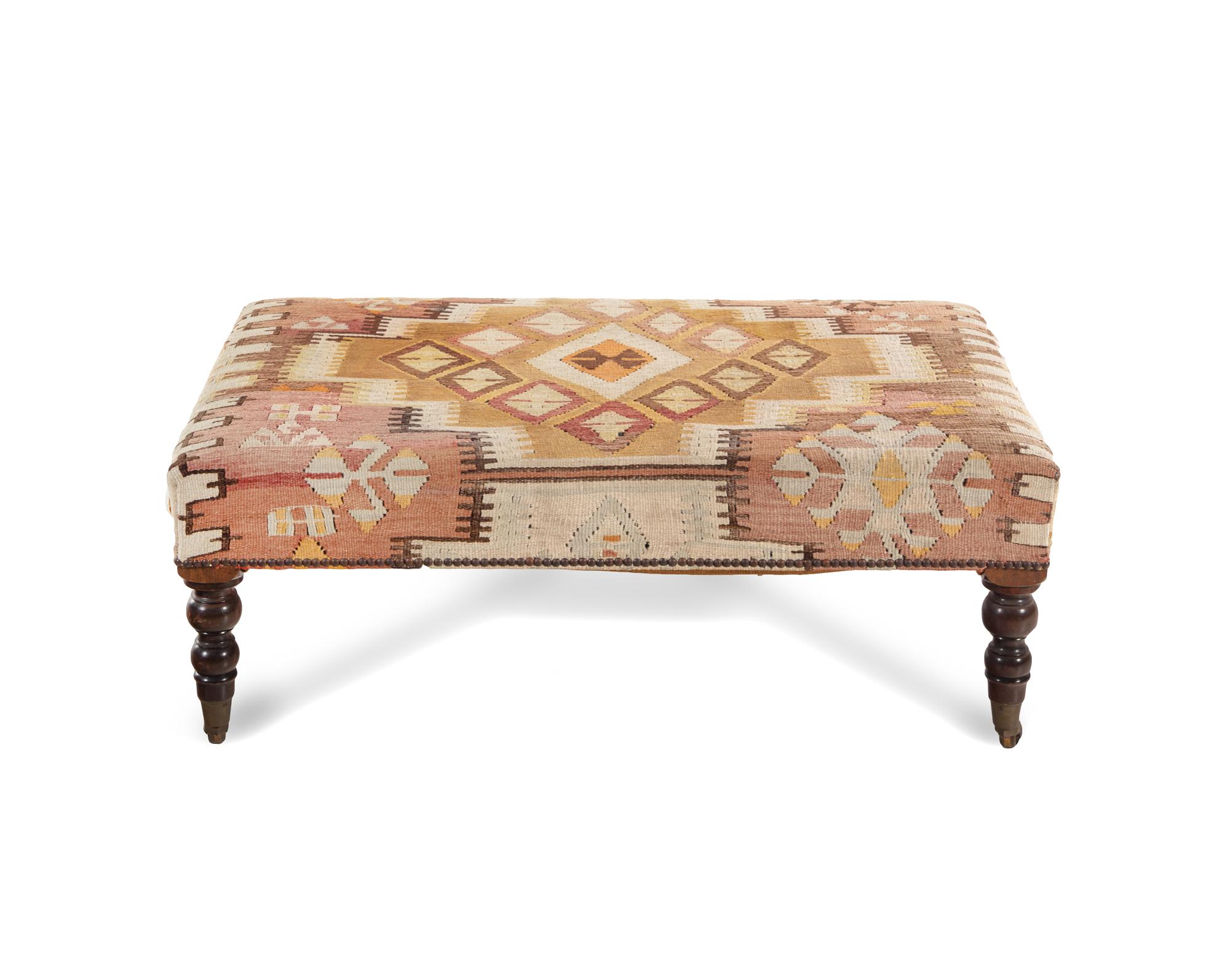 A Kilim Upholstered Ottoman