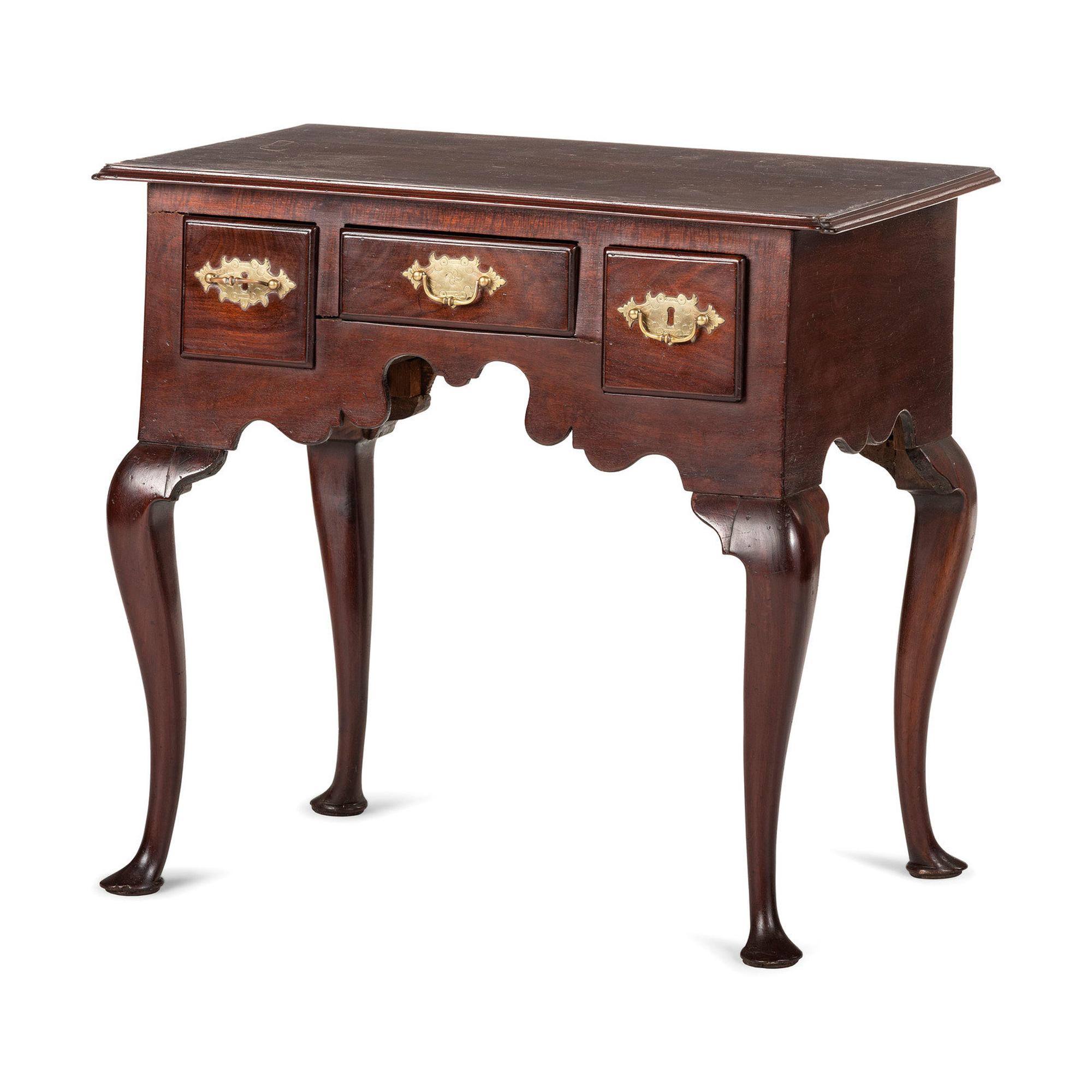 A Queen Anne Figured Mahogany Pad Foot Dressing Table