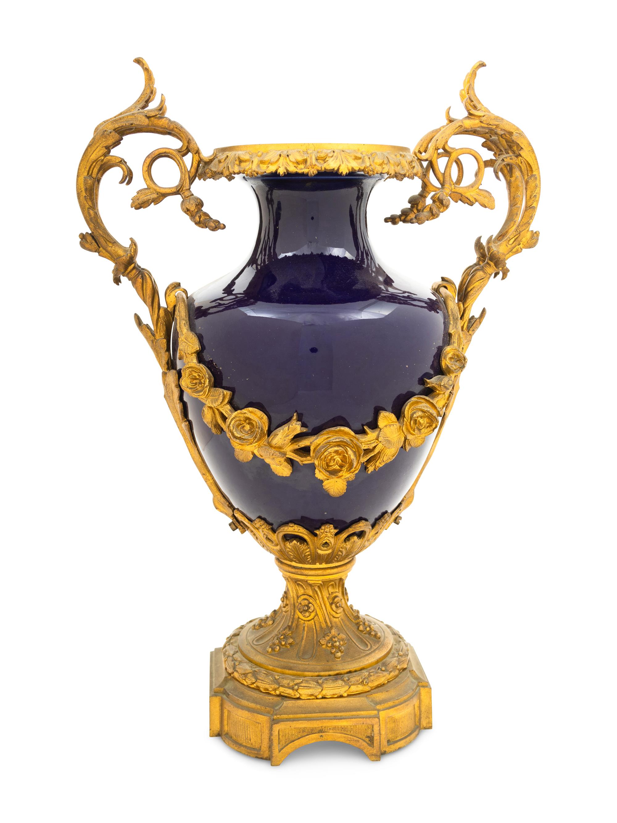 A Sèvres Style Gilt Bronze Mounted Porcelain Urn