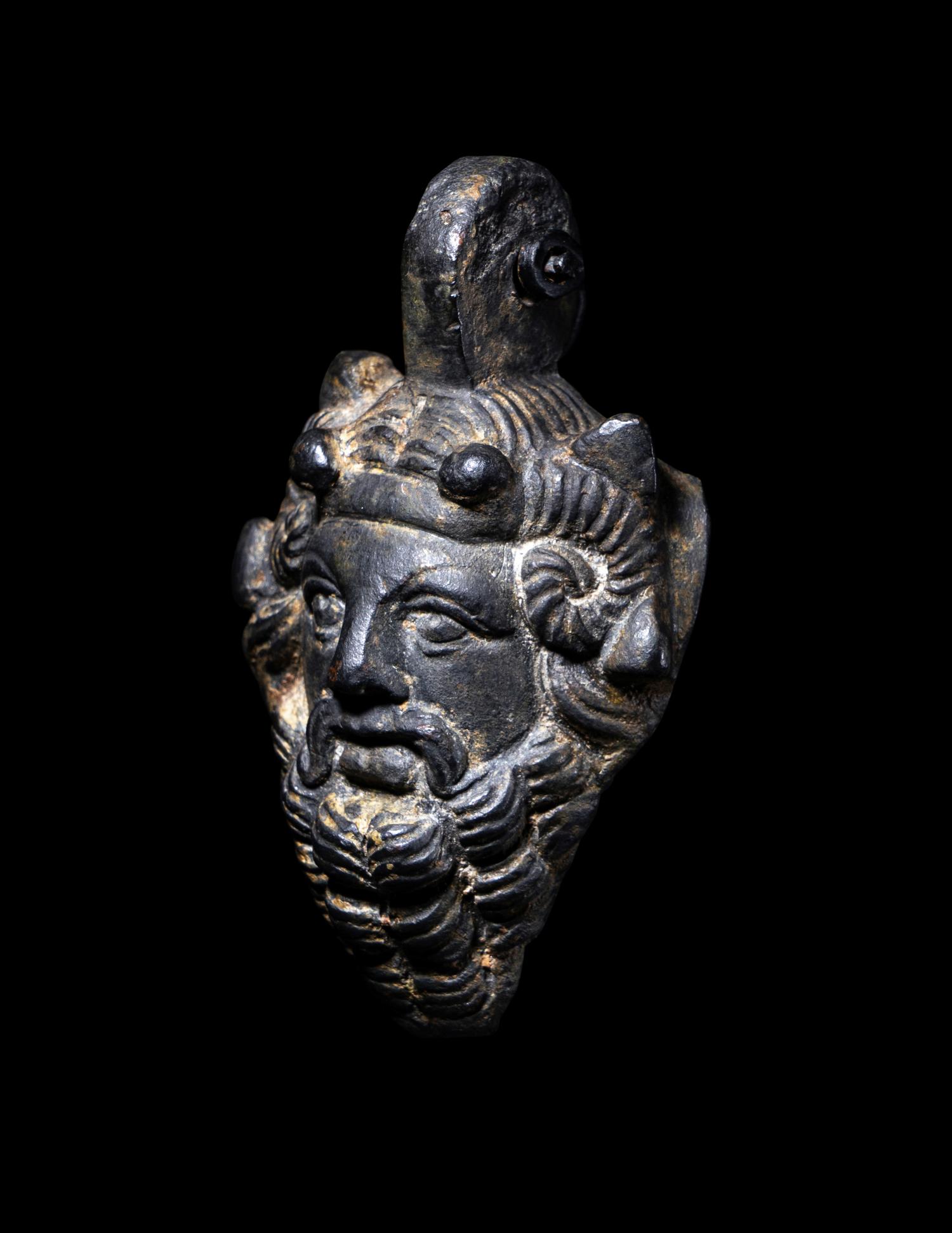 A Roman Bronze Zeus-Ammon Applique