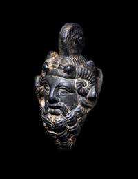 A Roman Bronze Zeus-Ammon Applique