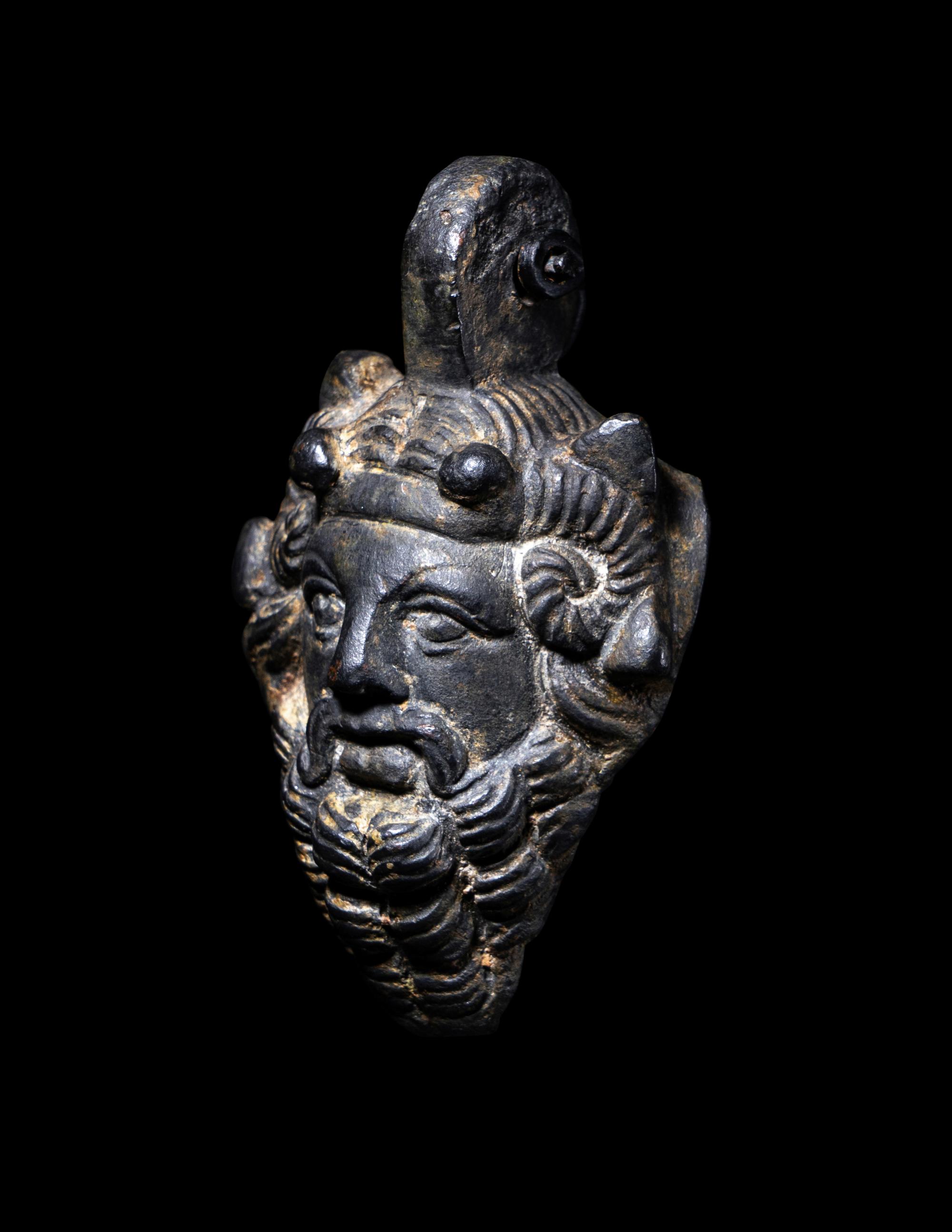 A Roman Bronze Zeus-Ammon Applique