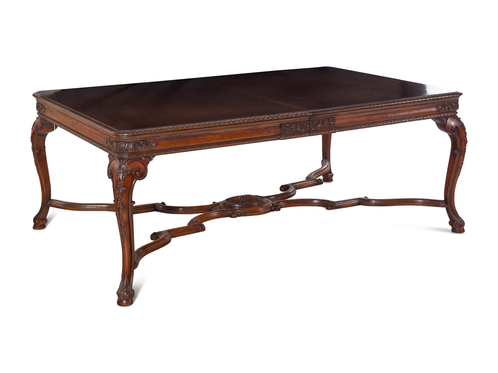 A George II Style Walnut Dining Table