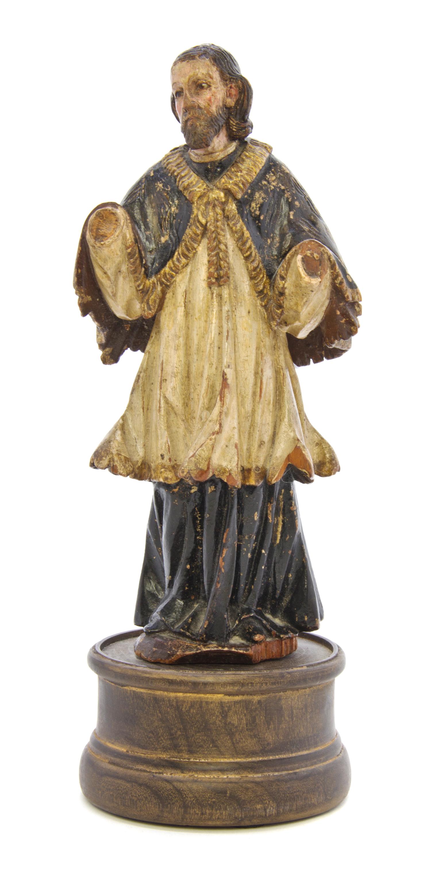 A South American Polychrome Decorated Santos Figure, Height of figure 8 1/4 inches.