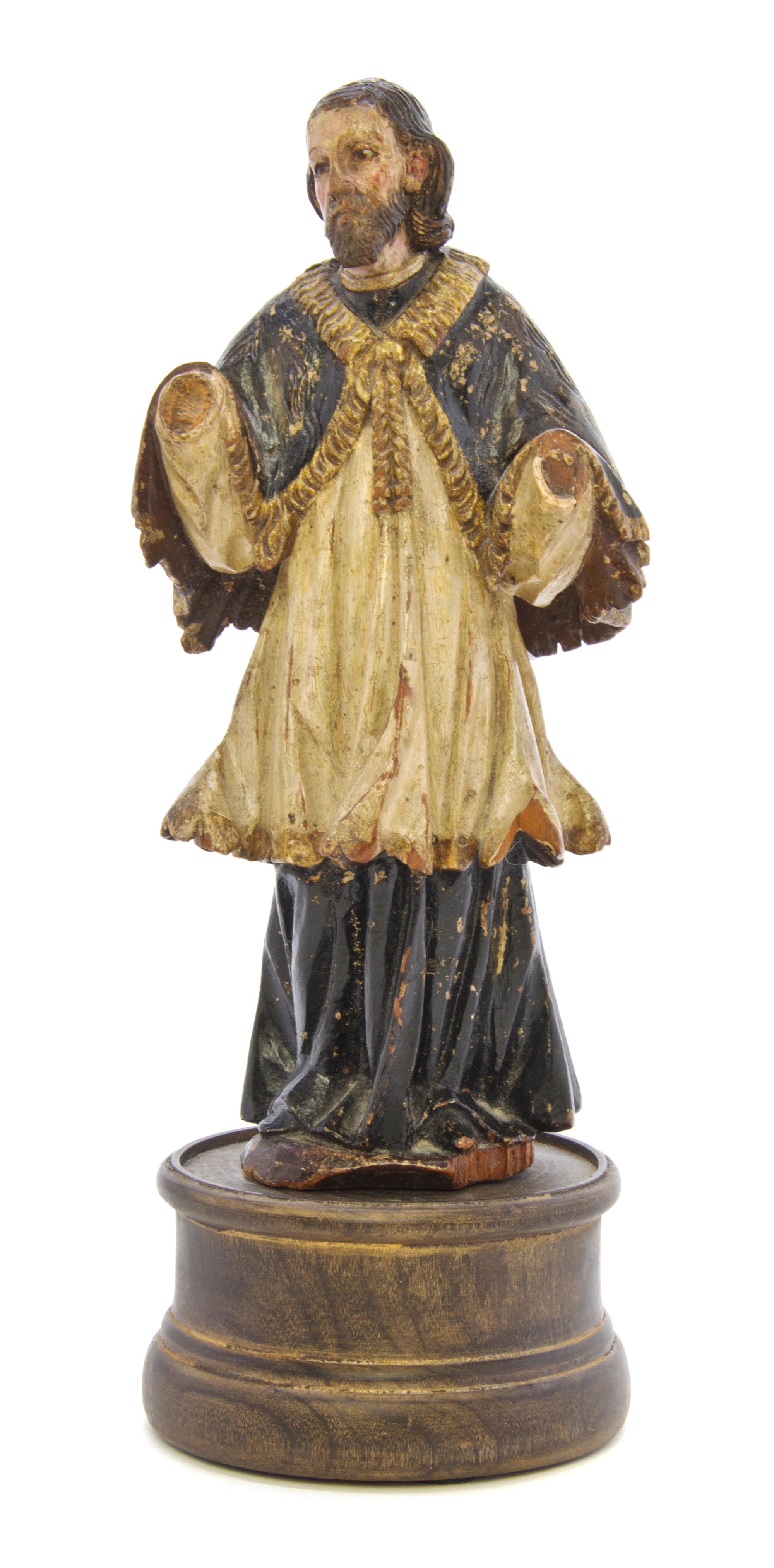 A South American Polychrome Decorated Santos Figure, Height of figure 8 1/4 inches.
