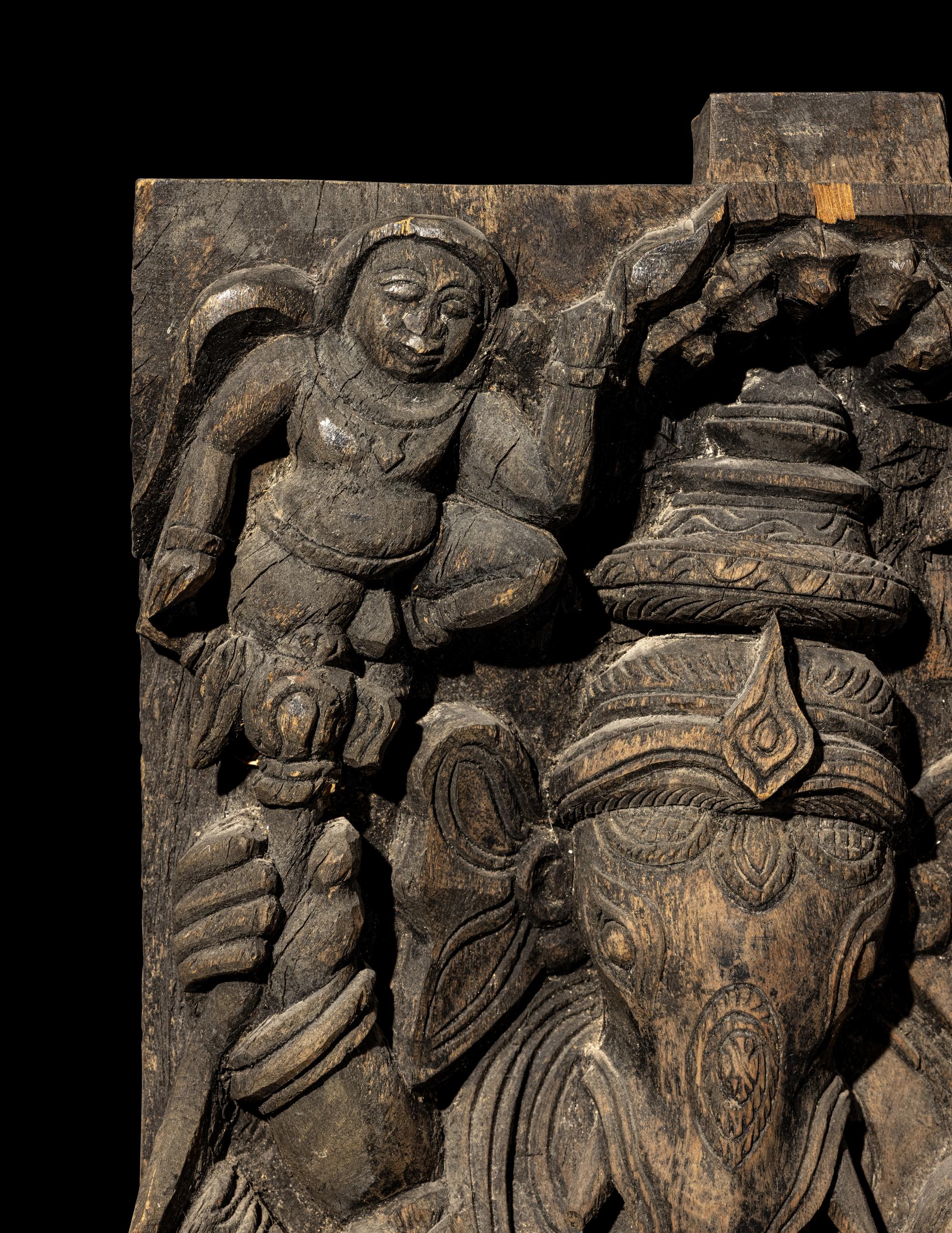 An Indian Carved Wood Panel of A Ganesha