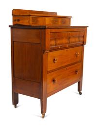 A Classical Style Cherrywood and Mahogany Chest of Drawers