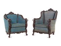 A Pair of Carved Walnut Armchairs in the Style of Karpen Bros.