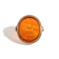 A Neoclassical Gold and Carnelian Finger Ring with the God Zeus, a Reclining Female, and a Greek Inscription