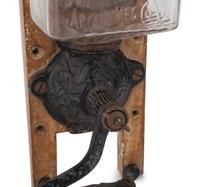 A Wall Mount Jewel Glass Coffee Grinder