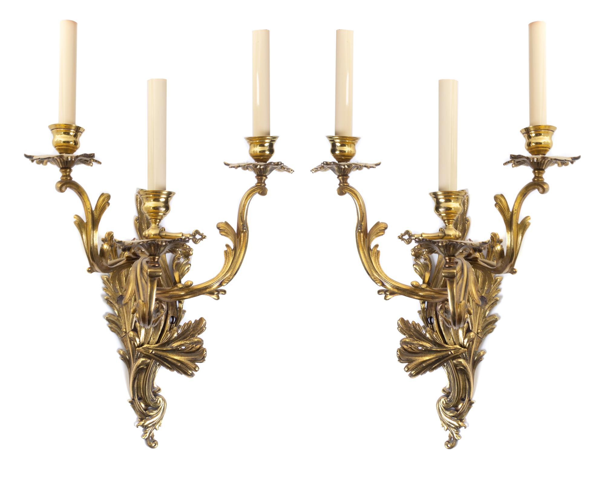 A Pair of Louis XV Style Gilt Bronze Three-Light Sconces